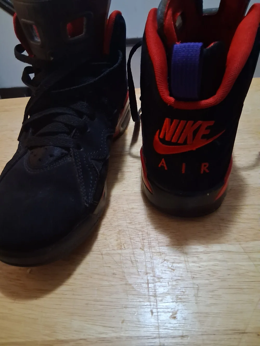 Jordas6 Retro Black High-Top Sneakers with Red Lining and Purple Pull Tab